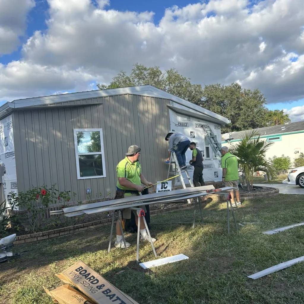 Regalbuto Contractors installing siding on a home as part of exterior upgrades offered